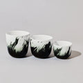 Hand crafted ceramic coffee cup with black and white brushstroke finish, FLTR Coffee